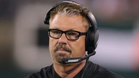 Gregg Williams wearing a headset