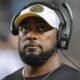 Steelers coach Mike Tomlin with a headset on