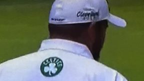 A Celtics logo on the back of a shirt