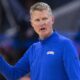 Warriors coach Steve Kerr in a blue warmup jacket
