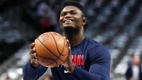 Zion Williamson holds a ball