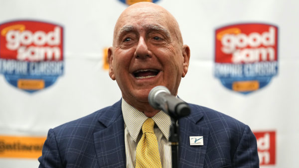 Dick Vitale speaking into a microphone