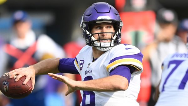 Kirk Cousins drops back to pass