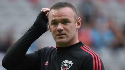 Wayne Rooney with his hand on his head
