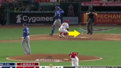 Phil Gosselin crouches down