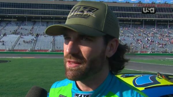 Corey LaJoie looking on