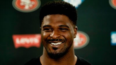 Dee Ford smiles