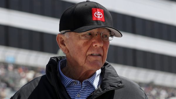 Joe Gibbs wearing a hat