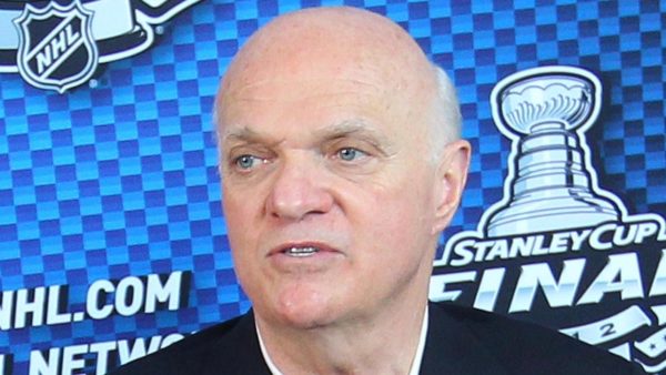 Lou Lamoriello looking away.