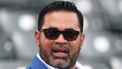 Ozzie Guillen wearing sunglasses