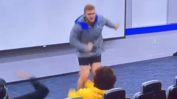 Aidan Hutchinson dances in the locker room