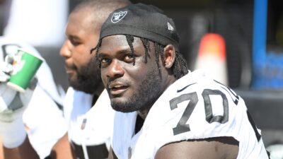 Alex Leatherwood on the bench