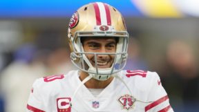 Jimmy Garoppolo in a helmet and pads