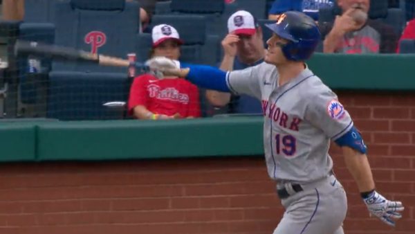 Mark Canha flips his bat