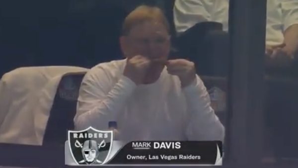 Mark Davis eating a chicken wing