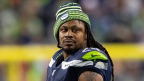 Marshawn Lynch in a beanie