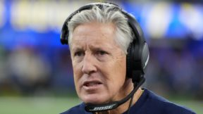 Pete Carroll with a headset on