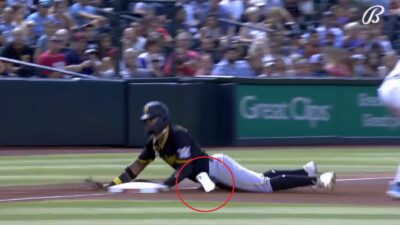 Rodolfo Castro dives into the base