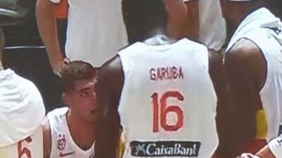 Usman Garuba with his back turned