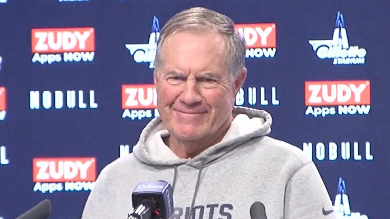 Bill Belichick smiles at a press conference