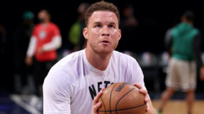 Blake Griffin warms up before a game