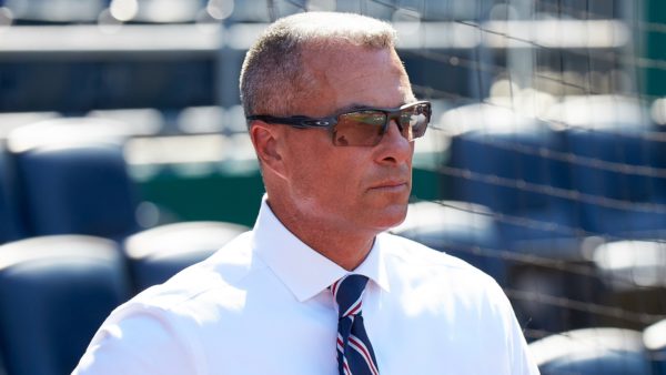 Dayton Moore wearing sunglasses