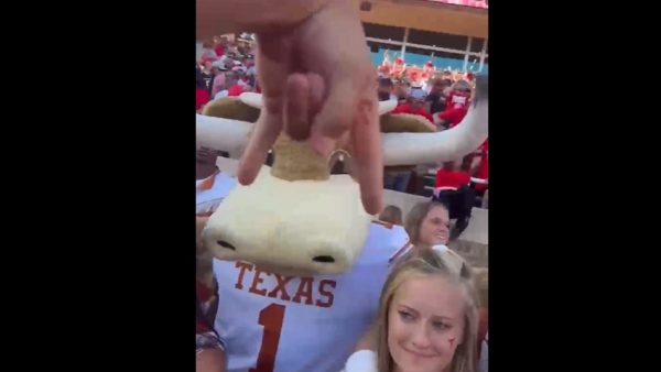 Texas Tech fan does Horns Down