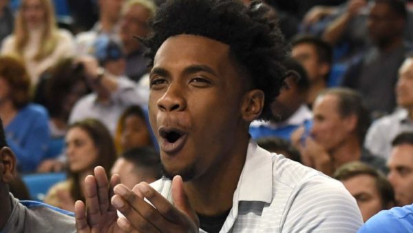 Jalen Hill reacting on the bench