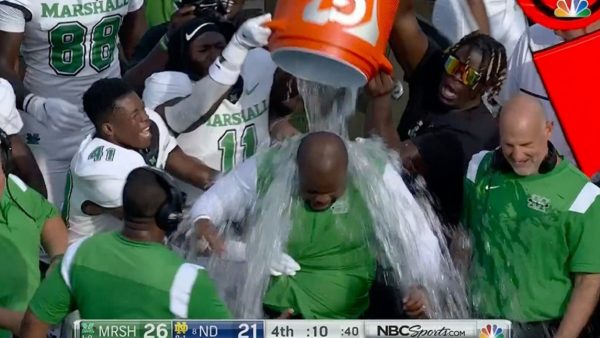 Charles Huff has a bucket dumped on him