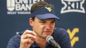 Neal Brown talks with the media