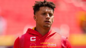 Patrick Mahomes during warmups wearing a Chiefs hoodie