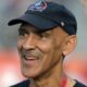 Tony Dungy with a hat on