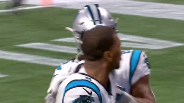 DJ Moore is penalized for taking his helmet off