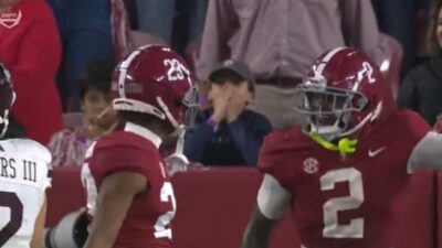 DeMarcco Hellams points at Jahquez Robinson