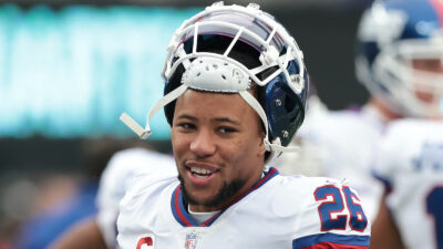 Saquon Barkley takes off his helmet