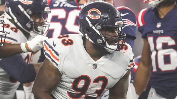 Justin Jones holds a ball