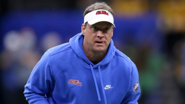 Lane Kiffin in a visor