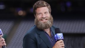 Ryan Fitzpatrick holding a microphone