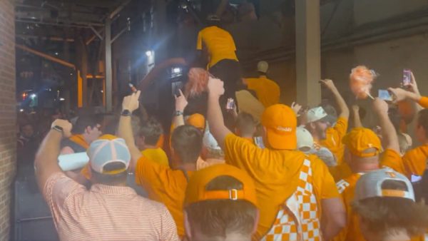 Tennessee fans hold goal posts