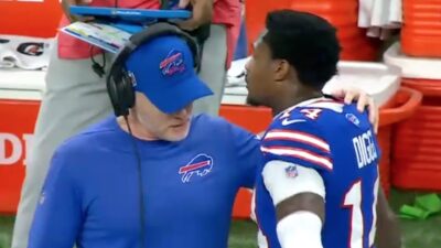 Stefon Diggs and Sean McDermott talk on the sideline