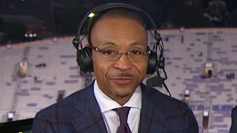 Gus Johnson with a headset on