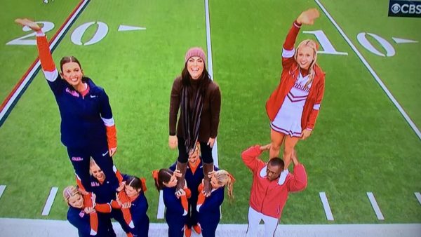 Jenny  Dell Payton and Jordan Huguley stand