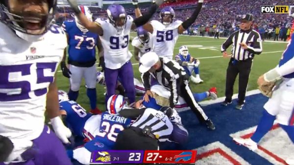 Vikings players signal touchdown