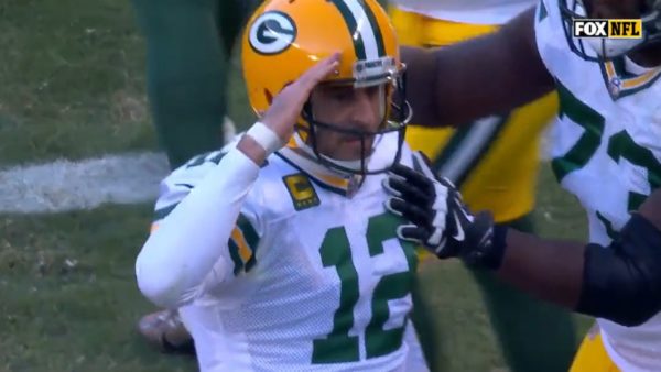 Aaron Rodgers does a salute