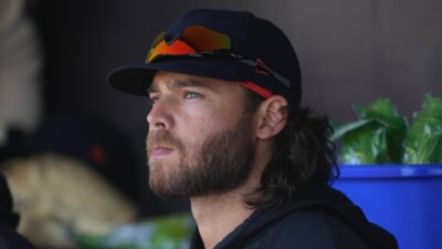 Brandon Crawford looking on from the dugout