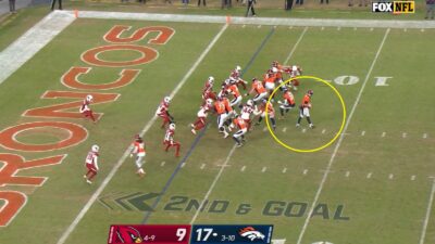 Brett Rypien holding the ball