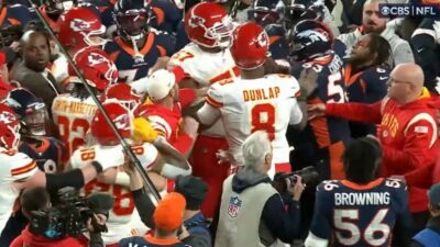 Broncos and Chiefs players tangled up