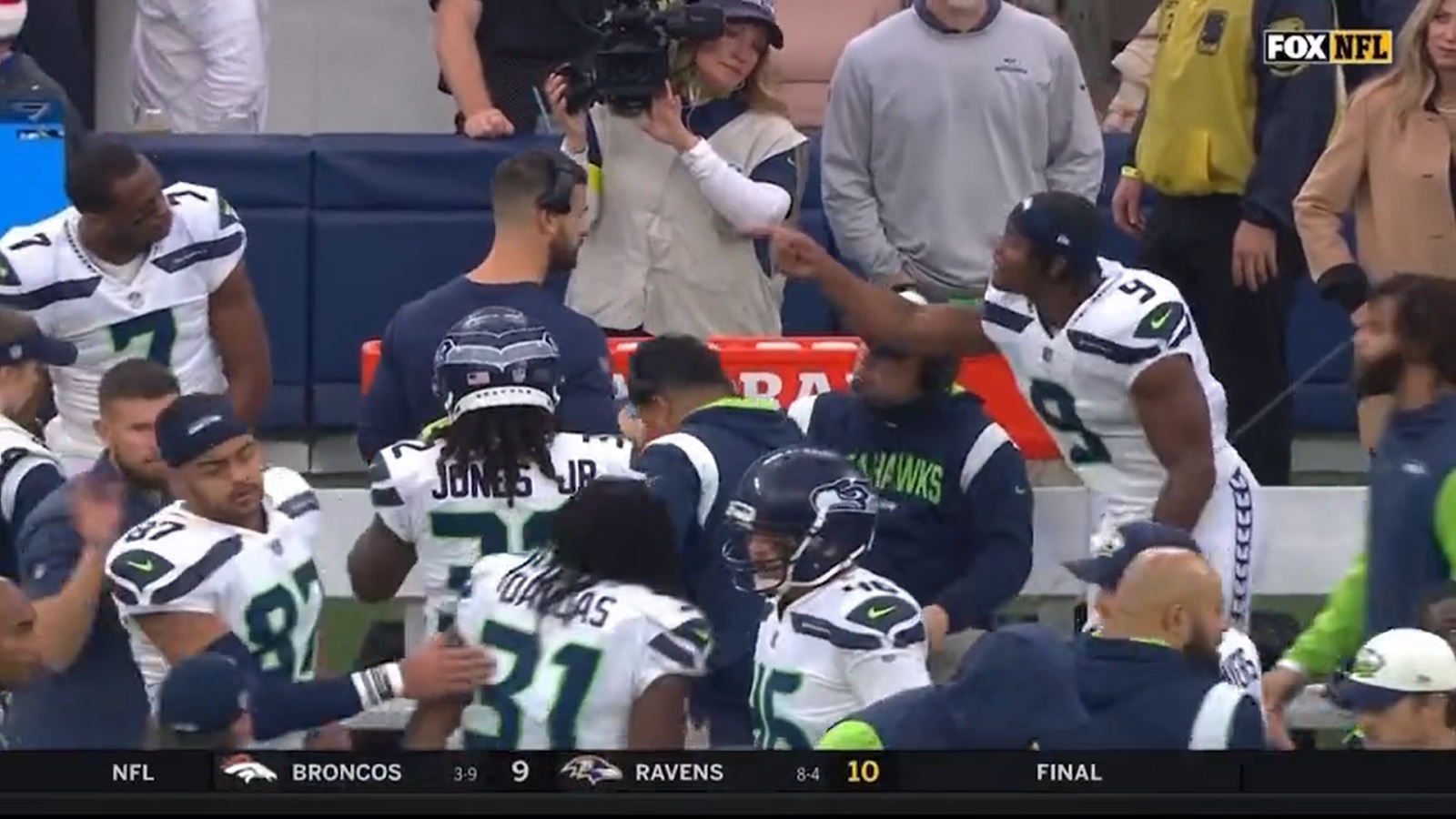 LOOK: Seahawks' Geno Smith, Kenneth Walker III point fingers at