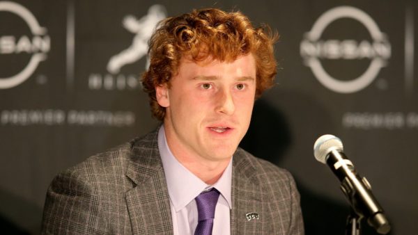 Max Duggan at a press conference