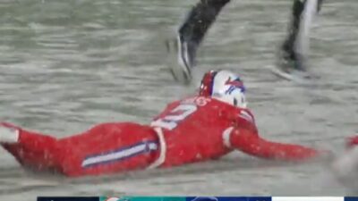 Tyler Bass sliding in the snow